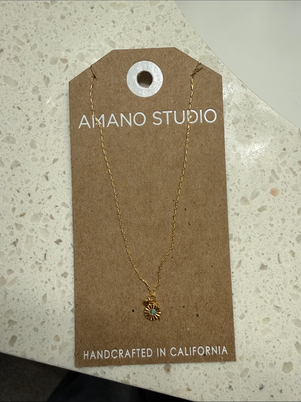 Gold Sunburst Pendant Necklace with Turquoise Accent